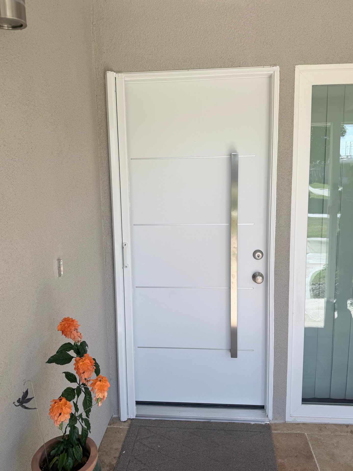 The same entry with its retractable screen tucked to the side